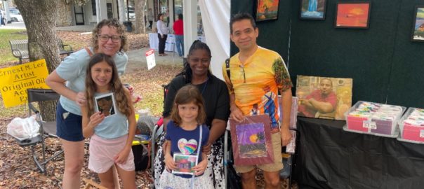 Mrs. Gloria Lee with happy customers at the Thornebrook Spring Arts Festival in Gainesville, Fla, March 2-3, 2024.